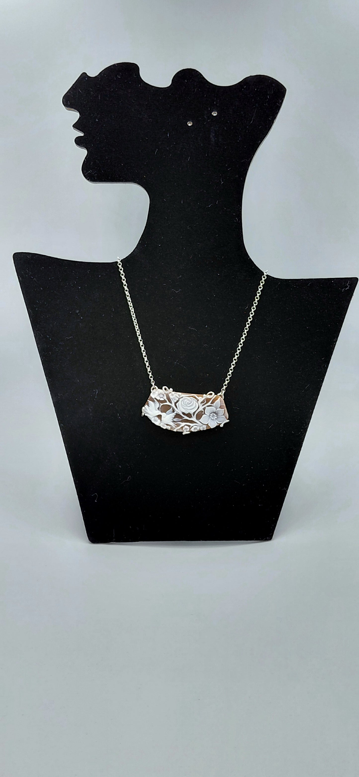 collier fiori ucelli -cammeo conchiglia sardonica montato in argento 925