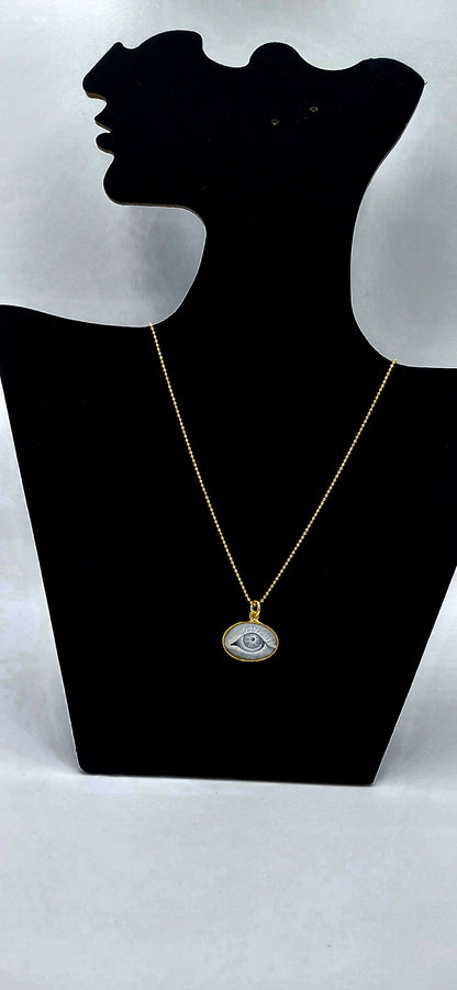 CIONDOLO CAMMEO "OCCHIO "IN ARGENTO 925 DORATO