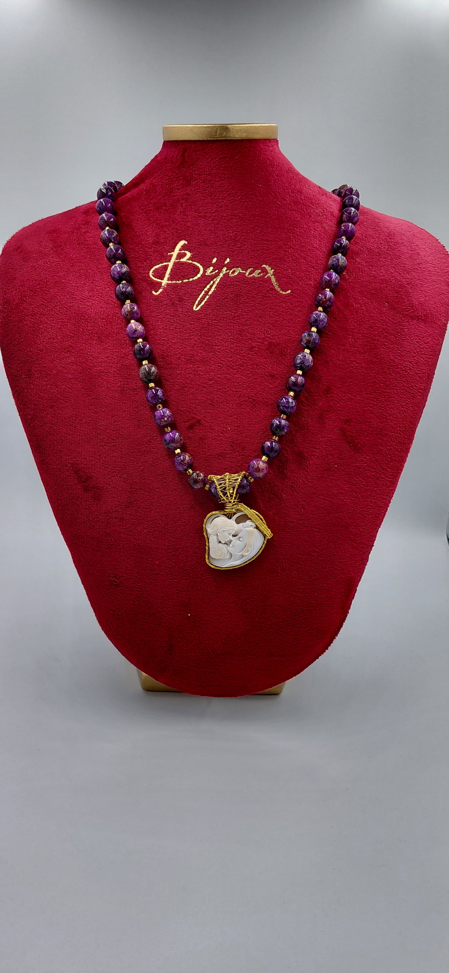 Cammeo conchiglia sardonica "Mamma e bambino " incastonato in metallo